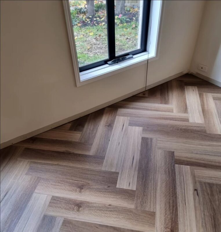 BGH702 QLD SPOTTED GUM HERRINGBONE 8MM WATERPROOF HYBRID SPC